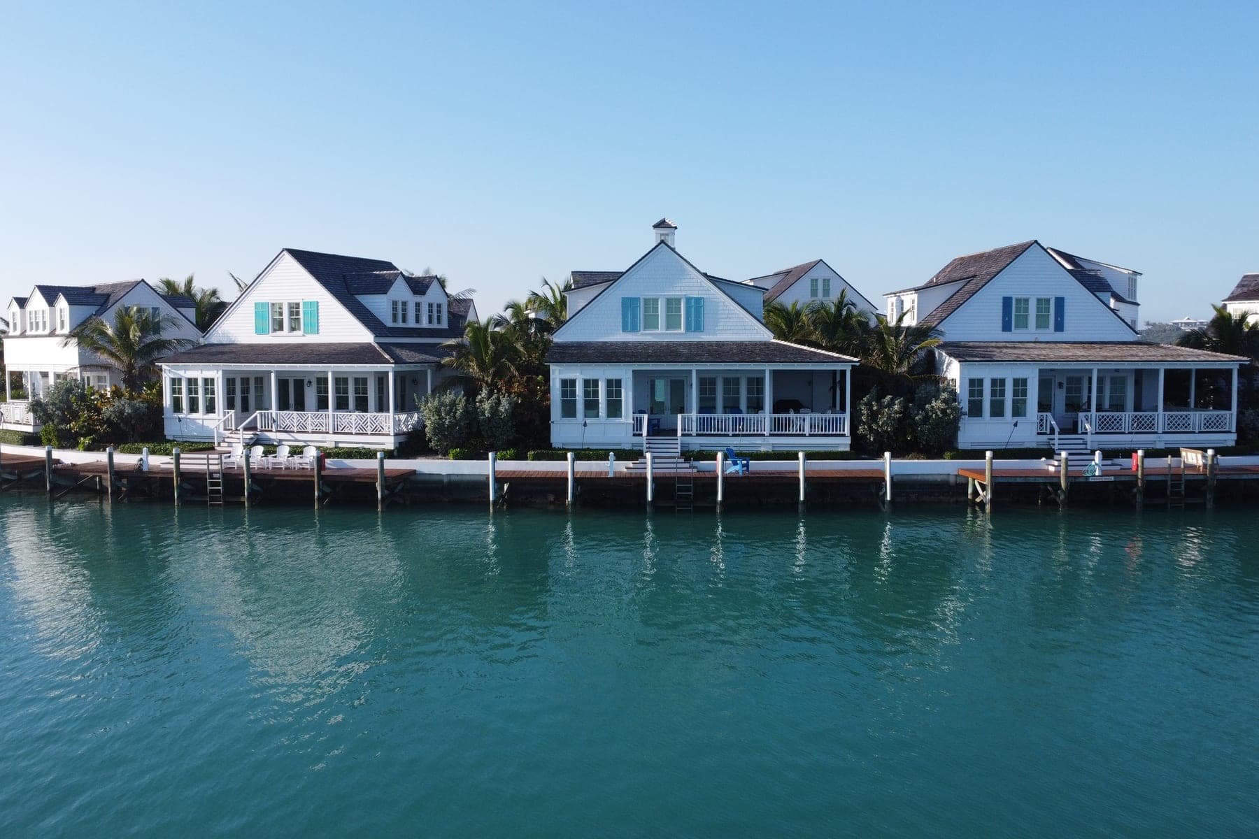 Abaco Inn cottages seen from the water, behind their dock