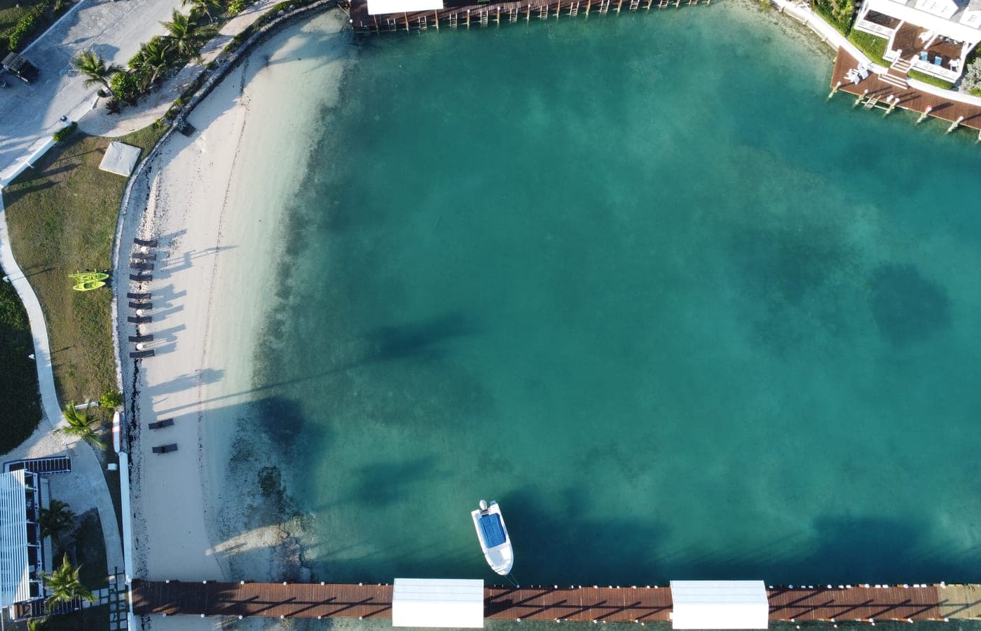 The calm cove and its beach from above