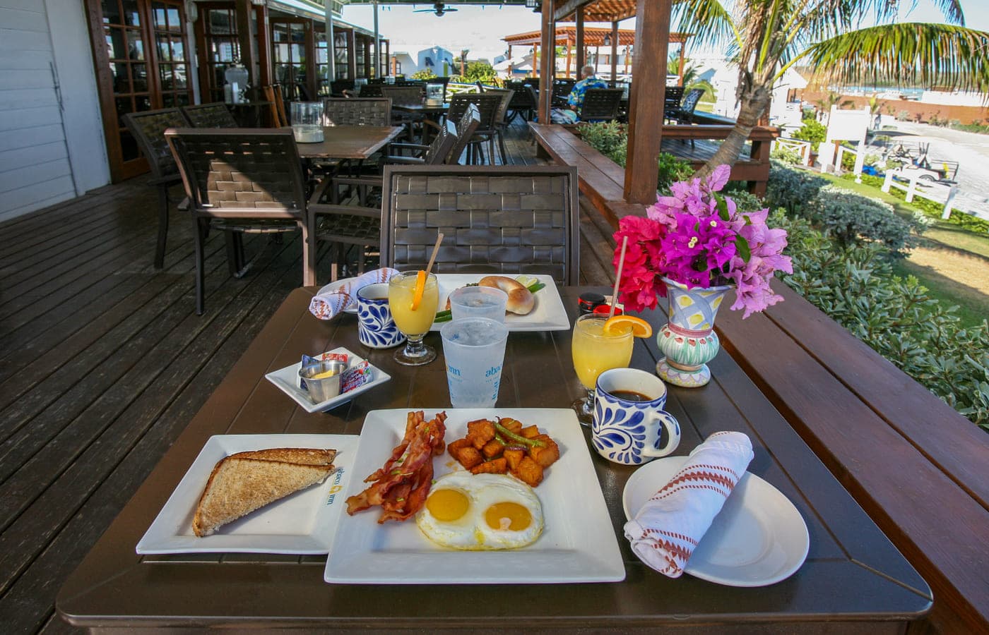 The covered restaurant deck set for service