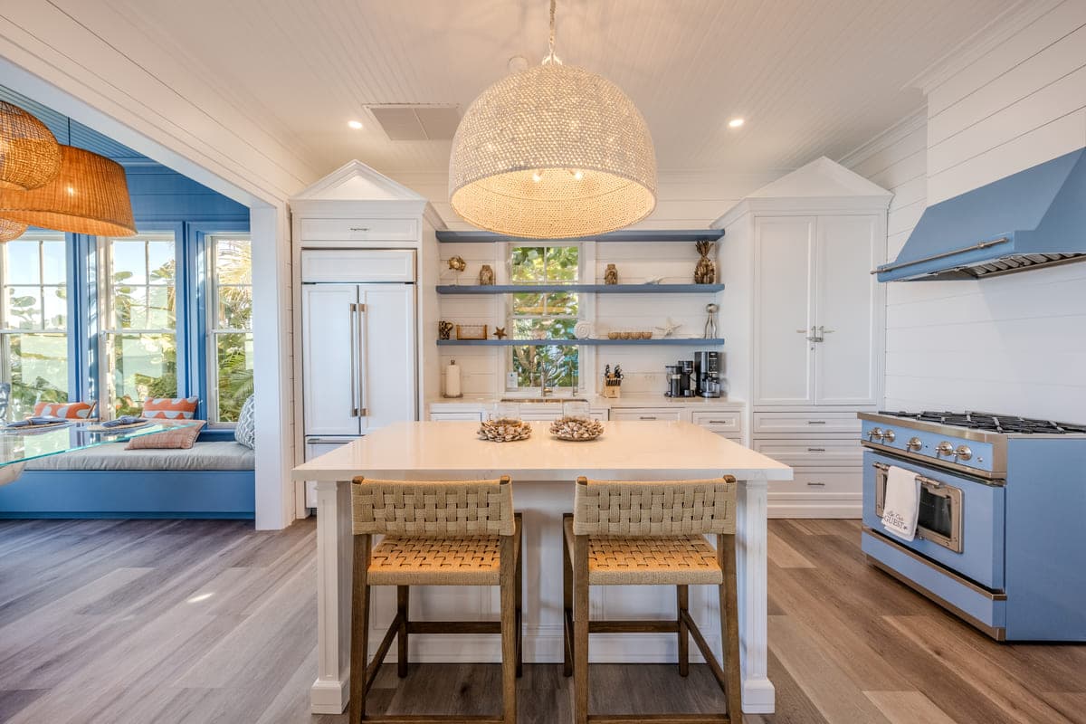 Villa kitchen with an island and bar stools