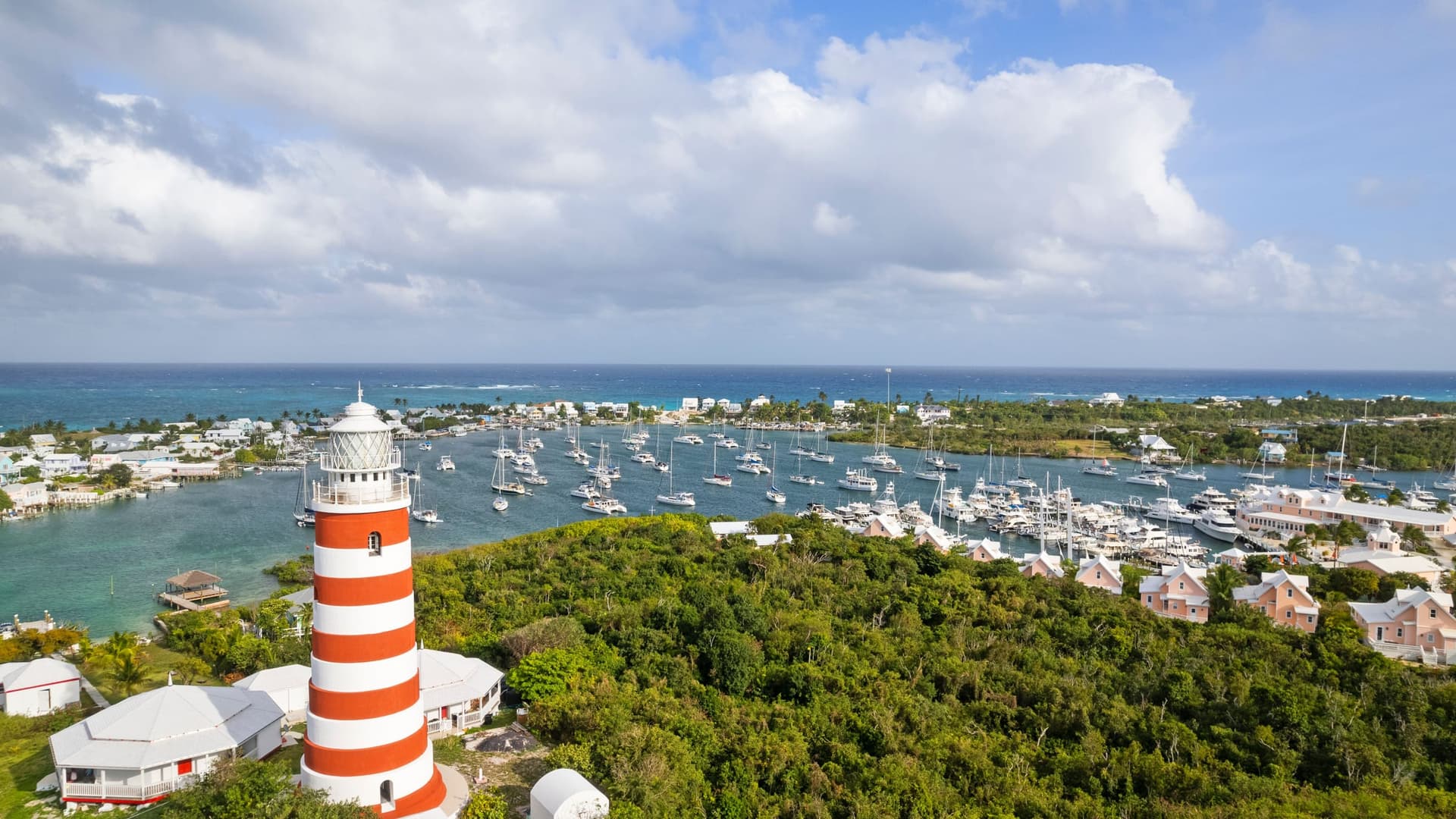 The Elbow Reef Lighthouse above Hope Town harbour